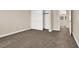 A spacious bedroom features neutral walls, plush carpeting, and closet at 1307 Summer Dawn Ave, Henderson, NV 89014