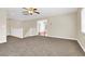 Bright bonus room with neutral carpeting, ceiling fan and view to the mountains at 1307 Summer Dawn Ave, Henderson, NV 89014
