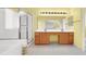 Bright main bathroom with a stand-alone shower, a separate soaking tub, and dual sinks at 1307 Summer Dawn Ave, Henderson, NV 89014