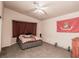 Spacious bedroom with ceiling fan and ample space for decor at 1636 Royal Palm Dr, Las Vegas, NV 89128