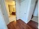 Bright bathroom with modern vanity, neutral tile and tub/shower combo at 200 W Sahara Ave # 3909, Las Vegas, NV 89102