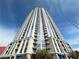 Modern high-rise building featuring sleek architecture and multiple balconies against a clear blue sky at 200 W Sahara Ave # 3909, Las Vegas, NV 89102