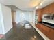 Open kitchen features stainless appliances, granite counters, and ample cabinet space at 200 W Sahara Ave # 3909, Las Vegas, NV 89102