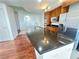 Modern kitchen with stainless steel appliances, granite countertops, and dark wood cabinetry at 200 W Sahara Ave # 3909, Las Vegas, NV 89102