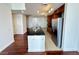 Bright kitchen boasts stainless steel appliances and a black granite-topped island at 200 W Sahara Ave # 3909, Las Vegas, NV 89102