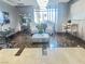 Inviting lobby with stylish seating, decorative mirror, and views to exterior through large windows at 200 W Sahara Ave # 3909, Las Vegas, NV 89102