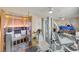 Home gym features a built-in wooden sauna, lots of natural light, and various exercise equipment at 2125 Mateuse St, Logandale, NV 89021