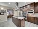 Modern kitchen with granite countertops, stainless appliances, and custom cabinetry at 2125 Mateuse St, Logandale, NV 89021