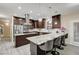 Modern kitchen featuring granite countertops, stainless steel appliances, and pendant lighting at 2125 Mateuse St, Logandale, NV 89021