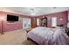 Inviting main bedroom with French doors, a ceiling fan, and decorative touches at 2125 Mateuse St, Logandale, NV 89021