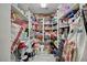 Walk-in pantry offers ample storage space with floor to ceiling shelves and organization at 2125 Mateuse St, Logandale, NV 89021