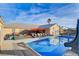 Swimming pool and lounge area, perfect for outdoor relaxation and entertaining, with a slide at 2125 Mateuse St, Logandale, NV 89021