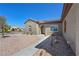 Inviting home exterior showcasing desert landscaping and a tiled roofline at 2320 Anderson Park Dr, Henderson, NV 89044
