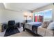 Bedroom boasts a large window with city views, plus a desk and chair for a productive workspace at 2700 Las Vegas Blvd # 4101, Las Vegas, NV 89109