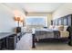 Bright bedroom features a large window with city views and stylish furniture for relaxation at 2700 Las Vegas Blvd # 4101, Las Vegas, NV 89109