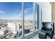 Enjoy amazing views from this high-rise home featuring a comfortable chair and ottoman at 2700 Las Vegas Blvd # 4101, Las Vegas, NV 89109