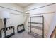 Walk-in closet featuring metal shelving and carpet flooring to maximize your storage needs at 2700 Las Vegas Blvd # 4101, Las Vegas, NV 89109