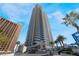 Luxurious high-rise building featuring a modern design and an array of balconies and palm trees at 2700 Las Vegas Blvd # 4101, Las Vegas, NV 89109