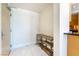 View of a clean foyer with a wooden shelf and access to the kitchen at 2700 Las Vegas Blvd # 4101, Las Vegas, NV 89109