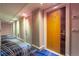 Hallway showing the entrance door to the apartment, painted in shades of beige and white at 2700 Las Vegas Blvd # 4101, Las Vegas, NV 89109