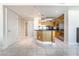 Modern kitchen with marble floors, wooden cabinets, stainless steel appliances, and a breakfast bar at 2700 Las Vegas Blvd # 4101, Las Vegas, NV 89109