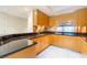 Beautiful kitchen offering granite countertops, wood cabinets, and stainless steel appliances at 2700 Las Vegas Blvd # 4101, Las Vegas, NV 89109