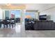 Open concept living space with dining area and city views through expansive windows at 2700 Las Vegas Blvd # 4101, Las Vegas, NV 89109