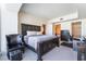This main bedroom features a large bed, seating area, walk-in closet and ensuite bathroom at 2700 Las Vegas Blvd # 4101, Las Vegas, NV 89109