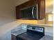 Kitchen area featuring granite countertops and stainless steel appliances at 2750 S Durango Dr # 2027, Las Vegas, NV 89117