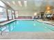 Bright indoor swimming pool and hot tub featuring large windows and skylights at 2750 S Durango Dr # 2027, Las Vegas, NV 89117