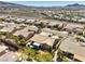 Scenic aerial view of a single Gathering home with desert landscaping and a covered patio at 2776 White Sage Dr, Henderson, NV 89052