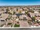Beautiful aerial view of a single-Gathering home with solar panels and a desert landscaped front yard at 2776 White Sage Dr, Henderson, NV 89052