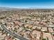 Panoramic aerial showing an active desert community with picturesque views of the city skyline at 2776 White Sage Dr, Henderson, NV 89052