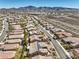 Wide aerial shot showcasing the community and desert landscape surrounding this single Gathering home at 2776 White Sage Dr, Henderson, NV 89052