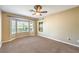 Spacious bedroom featuring a bay window overlooking the well landscaped backyard at 2776 White Sage Dr, Henderson, NV 89052