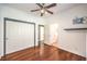 Secondary bedroom with wood floors, closet doors, and ensuite access at 2776 White Sage Dr, Henderson, NV 89052
