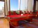Billiard room features a red pool table, comfortable chairs, and elegant design for a recreational experience at 2776 White Sage Dr, Henderson, NV 89052