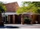 Entrance to the building, showing the columns and some desert landscaping at 2776 White Sage Dr, Henderson, NV 89052
