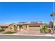 Welcoming single-story home features lush landscaping, brick driveway, and two-car garage at 2776 White Sage Dr, Henderson, NV 89052