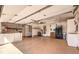 Spacious garage with organized storage, overhead racks, and a refrigerator included at 2776 White Sage Dr, Henderson, NV 89052