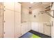 Garage storage area with pegboard and white built-in cabinets, offering ample space at 2776 White Sage Dr, Henderson, NV 89052