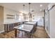 Kitchen with stainless steel appliances, large island with seating and lots of cabinets at 2776 White Sage Dr, Henderson, NV 89052