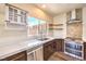 Kitchen with stainless steel dishwasher, stainless steel gas range, and modern faucet at 2776 White Sage Dr, Henderson, NV 89052