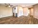 Spacious living room with hardwood floors, ceiling fan, and bright natural light at 2776 White Sage Dr, Henderson, NV 89052