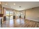 Hardwood floors, great light, and sliding glass doors make this living room an inviting place to relax at 2776 White Sage Dr, Henderson, NV 89052