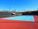 A well maintained tennis court with a mountain view that provides residents with recreational enjoyment at 2776 White Sage Dr, Henderson, NV 89052