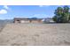 The backyard features a spacious lot, with desert landscaping, and potential for outdoor activities at 2831 Goldrush St, Pahrump, NV 89048