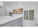 Neutral bathroom featuring a modern vanity, framed art and plush towels at 2831 Goldrush St, Pahrump, NV 89048