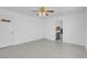 Bright bedroom with tile flooring, ceiling fan and bathroom access at 2831 Goldrush St, Pahrump, NV 89048