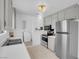 This kitchen boasts stainless steel appliances and gray cabinets at 2831 Goldrush St, Pahrump, NV 89048